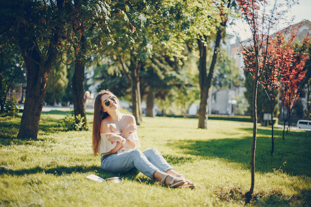 girl in a park - 写真・画像