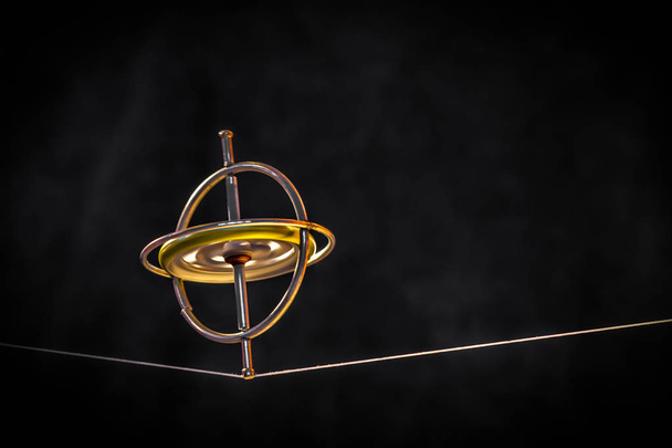 Игрушечный гироскоп балансирует на линии
 - Фото, изображение