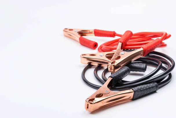 Two jumper cables for car battery isolated on white background. - Foto, Imagen