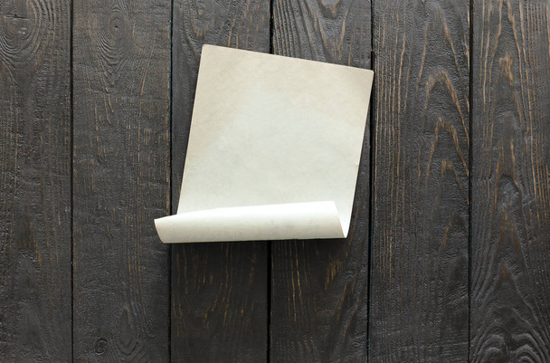 old paper on wooden wall - Φωτογραφία, εικόνα
