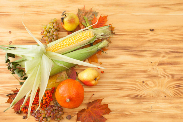 Fall foods, harvest on a wooden table. Background. - Foto, Imagem