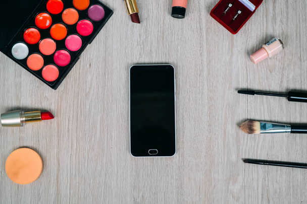 Top view of cosmetics and make-up items - 写真・画像