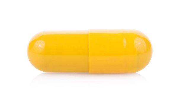 pillen capsules geïsoleerd op witte achtergrond - Foto, afbeelding
