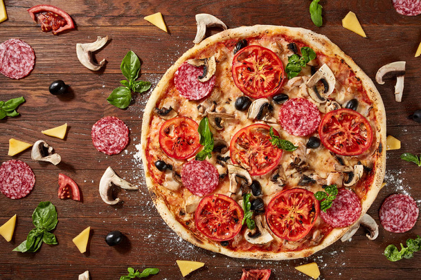 delicious italian pizza served on wooden table - 写真・画像