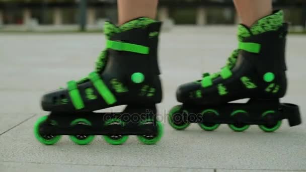 Roller skates close-up. Girl on the rollers. - Footage, Video