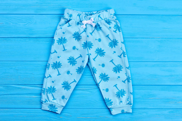 Light blue palm print baby pants. - Photo, Image