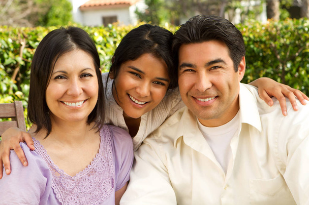Hispanic family with a teen daughter. - Photo, Image