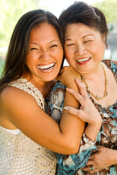 Asian mother and her adult daughter. - Fotó, kép