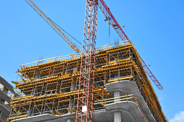 Crane and highrise construction site - Photo, Image