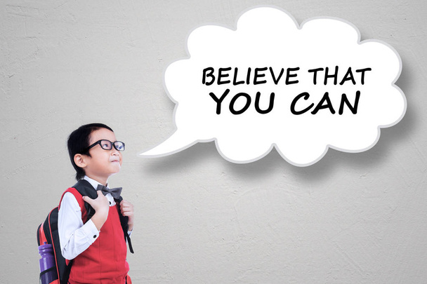 Boy and text of Believe That You Can - Photo, image