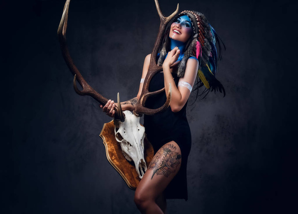 Female with Indian feather hat - Photo, Image