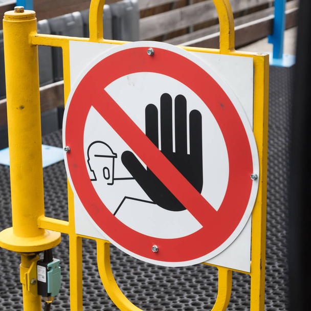 Stopping sign -The hand in the red circle - Photo, Image