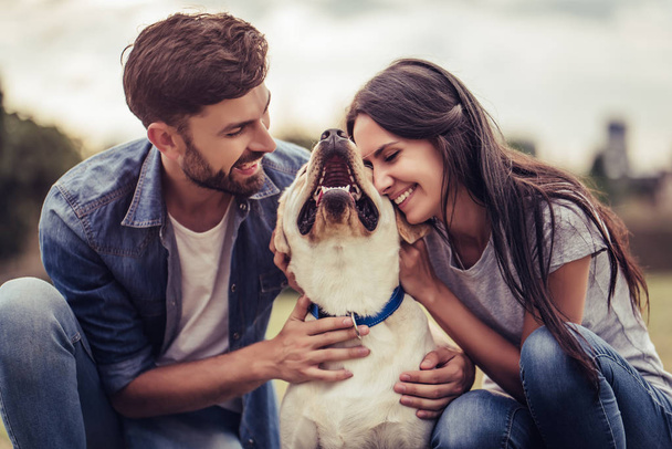 Couple with dog - Foto, Imagen