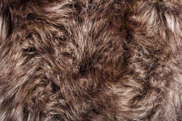 het patroon van bont. Red Brown Grey Wolf, Fox, Bear Fur natuurlijke, dier Wildlife Concept en stijl voor achtergrond, texturen en achtergronden. Macro bruin bont - Foto, afbeelding
