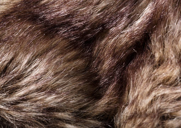 het patroon van bont. Red Brown Grey Wolf, Fox, Bear Fur natuurlijke, dier Wildlife Concept en stijl voor achtergrond, texturen en achtergronden. Macro bruin bont - Foto, afbeelding