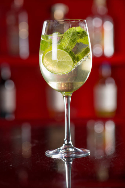 Glass of Hugo cocktail on a background - Фото, зображення