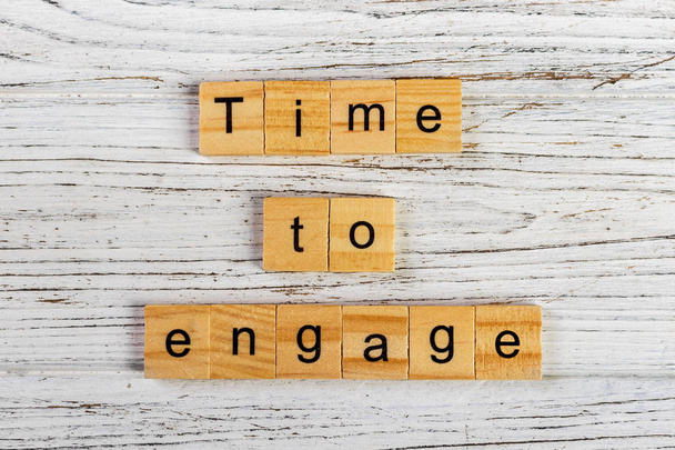 time to engage word made with wooden blocks concept - Photo, Image