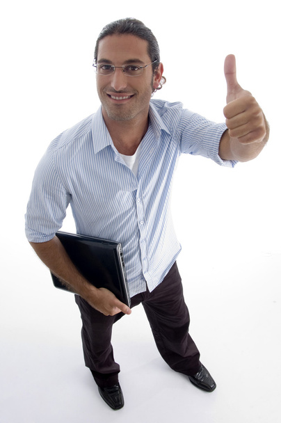 Hombre sosteniendo portátil gesto pulgares hacia arriba
 - Foto, Imagen