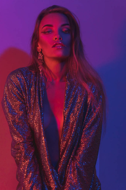 portrait of young beautiful lady with make up in glitter jacket - Foto, Imagem