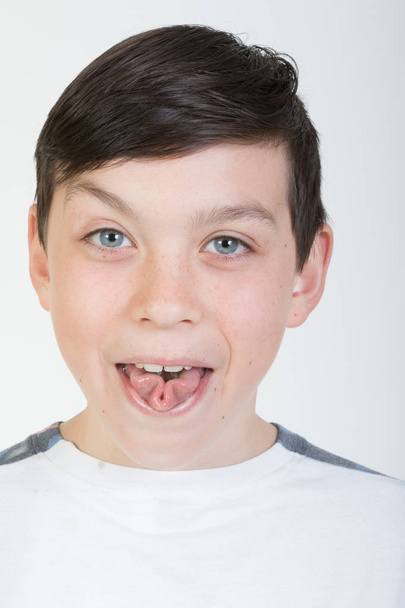 Boy rolling his tongue - Foto, Imagem