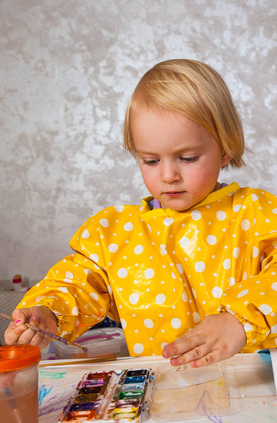 little girl paints with watercolors - Photo, Image