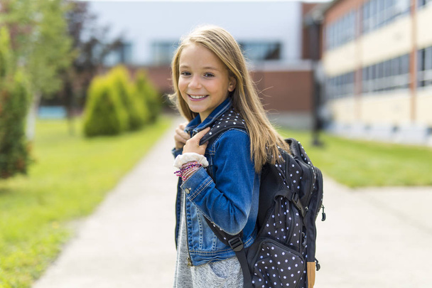 Great Portrait Of School Pupil Outside Classroom Carrying Bags - Fotoğraf, Görsel