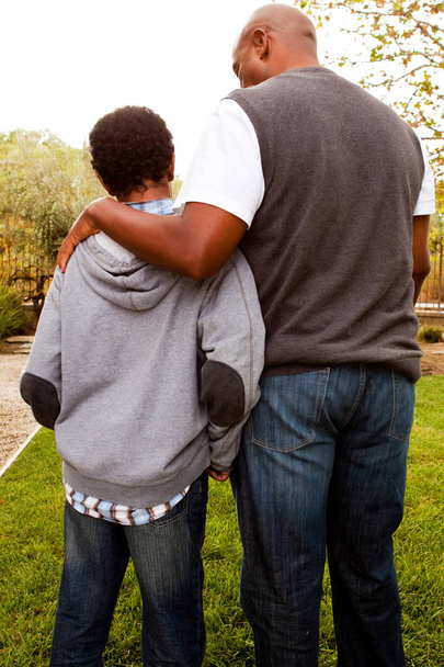 African American father parenting his son. - 写真・画像