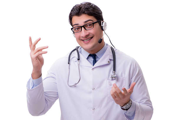 Jeune médecin avec casque de téléphone isolé sur blanc
 - Photo, image