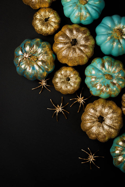 Shiny gold and blue Pumpkins with spiders - Foto, Bild