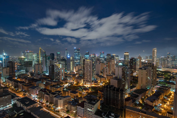Makati Skyline at sunset. Makati is a city in the Philippines - Photo, Image