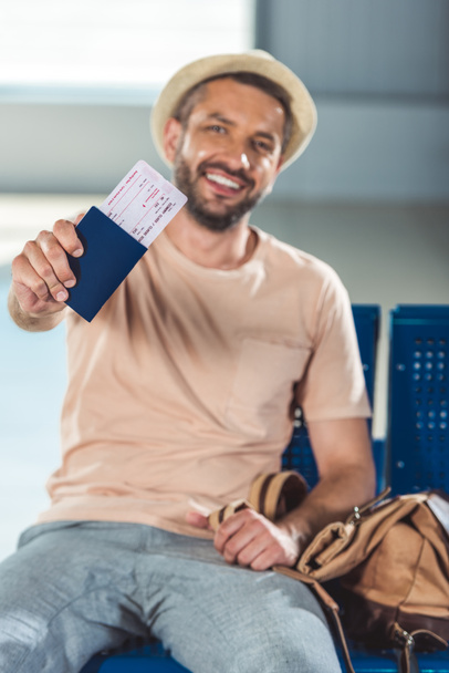 tourist showing passport and ticket - Photo, image