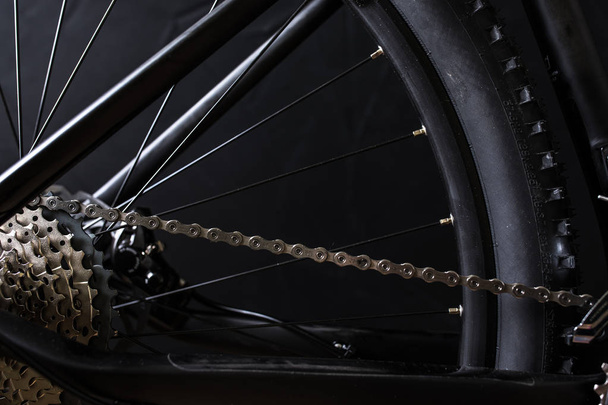 Modern MTB race mountain bike isolated on black background in a  - Zdjęcie, obraz