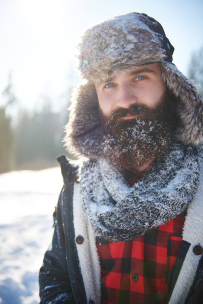 Man with some snow on his beard - Foto, Imagen
