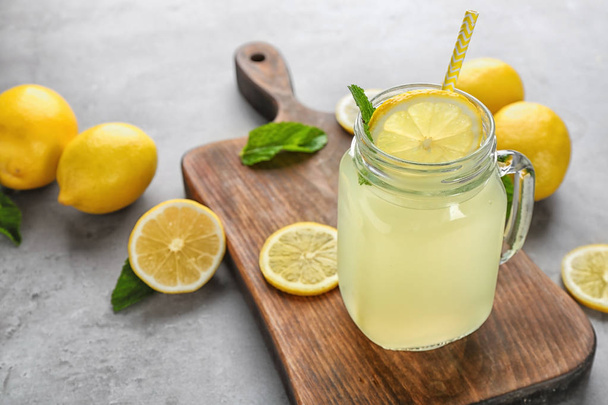 lemon juice and fresh lemons - 写真・画像