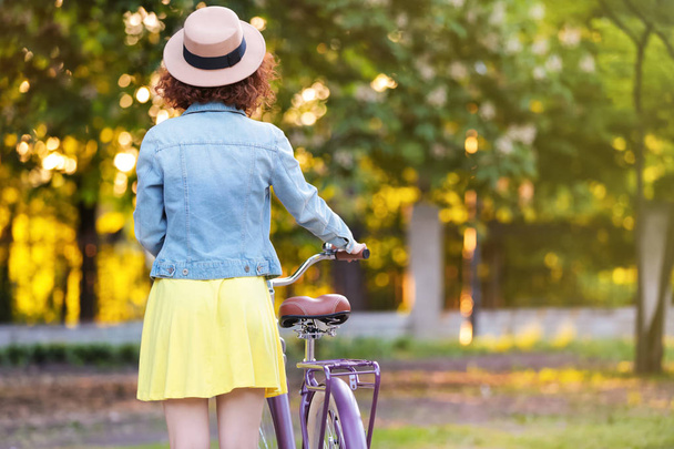 young woman with bicycle - Zdjęcie, obraz
