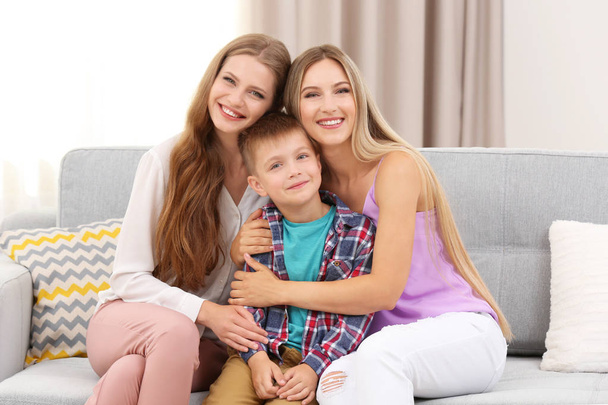 Female couple with foster son - Foto, afbeelding