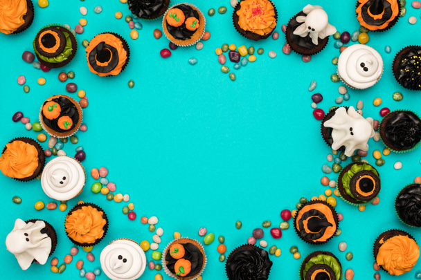 cupcakes y caramelos de halloween
 - Foto, Imagen