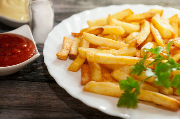 Close shot of french fries on a plate - Photo, Image