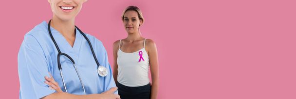 doctor against woman with Breast cancer awareness ribbon - Фото, зображення