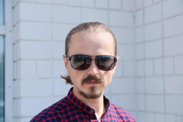 Portrait of cheerful bearded hipster man in black glasses - Fotografie, Obrázek