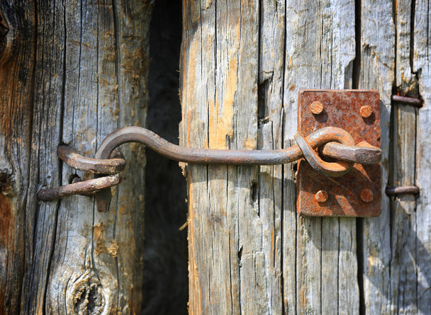 metal hook on wooden door - Photo, Image