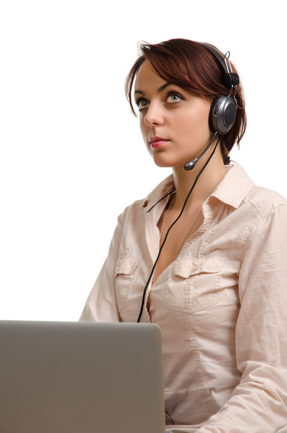 Call centre operator listening to a call - Photo, Image