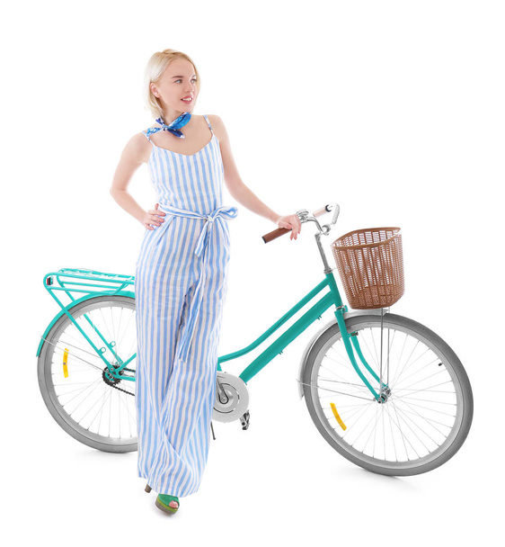 Beautiful young woman with bicycle   - Valokuva, kuva