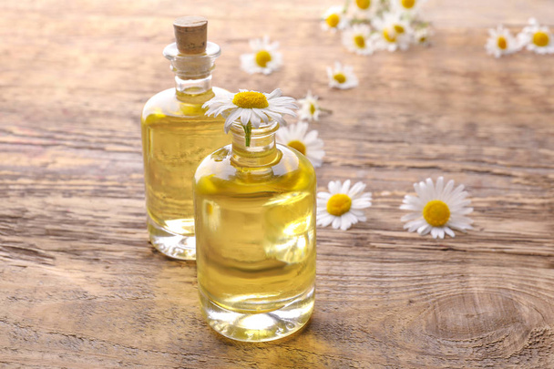 Bottles of essential oil  - Фото, зображення