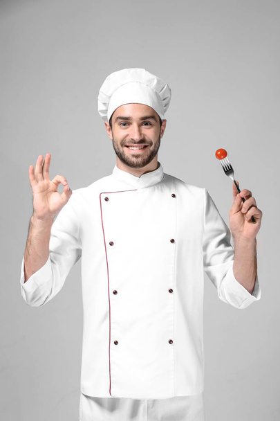 Young male chef  - Foto, afbeelding