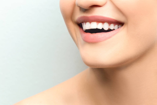 Young woman with healthy teeth   - Фото, изображение