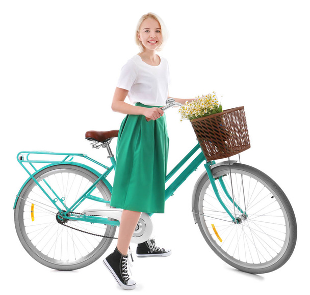 Beautiful young woman near bicycle   - Fotografie, Obrázek
