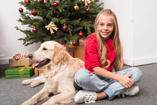 child with dog at christmas  - Zdjęcie, obraz