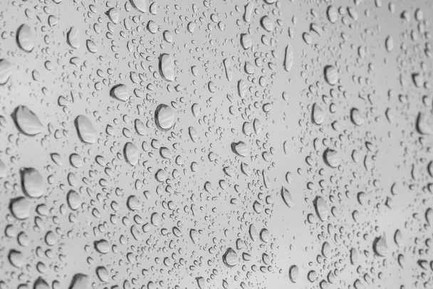 Esőcseppek az ablaküvegen - Fotó, kép