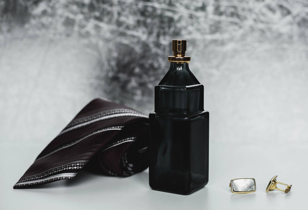 men's fashion accessories. Perfume with tie and cuff - Φωτογραφία, εικόνα